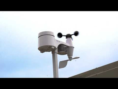 a white device with a propeller